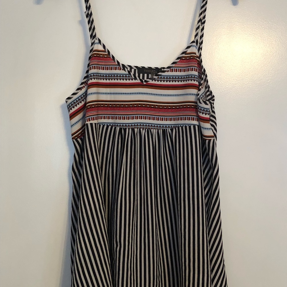 Tank with adjustable straps